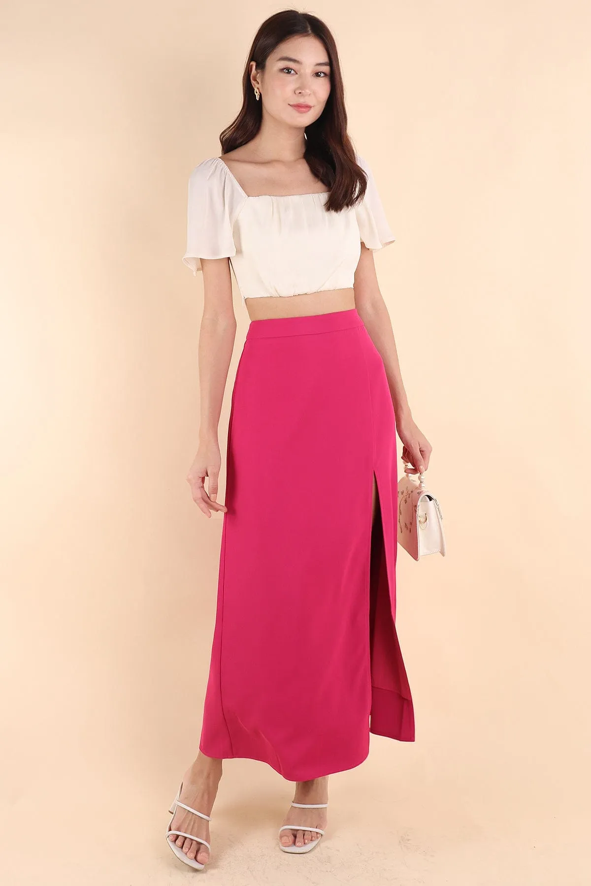 MINNIE SLIT MAXI SKIRT IN BARBIE PINK