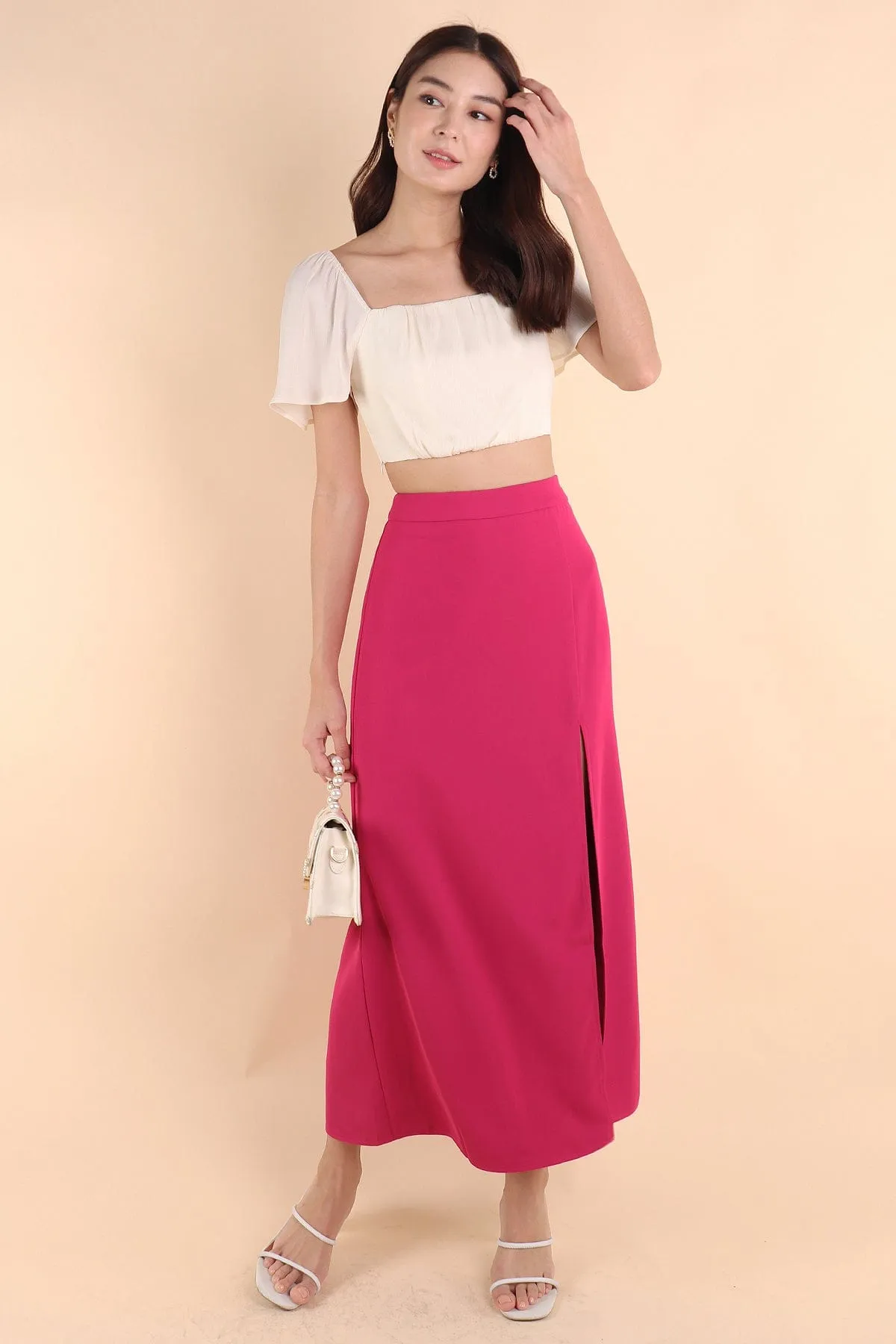 MINNIE SLIT MAXI SKIRT IN BARBIE PINK